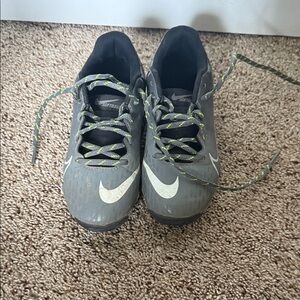 Nike Gray cleats with White and Green Accents